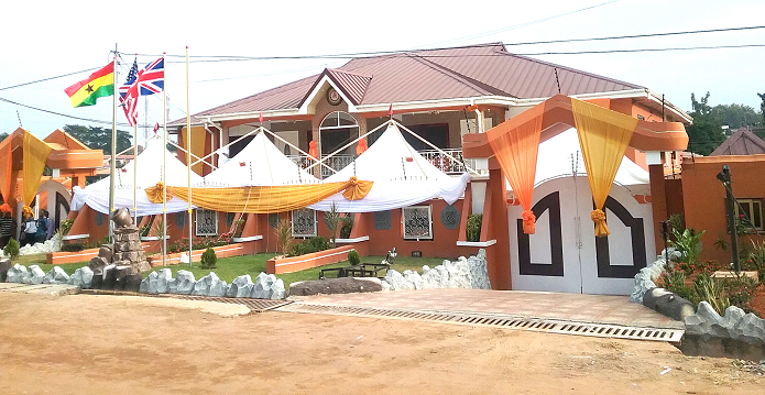 The Deputy Ashanti Regional Minister speaking at the inaugural ceremony of the hotel (INSET). Front view of the hotel The Deputy Ashanti Regional Minister speaking at the inaugural ceremony of the hotel (INSET). Front view of the hotel